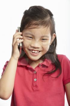 Studio Shot Of Chinese Girl With Mobile Phone