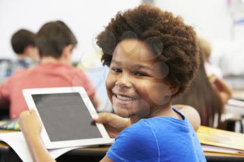 Pupil In Class Using Digital Tablet