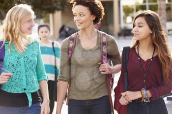 Three Female Students Walking To High School