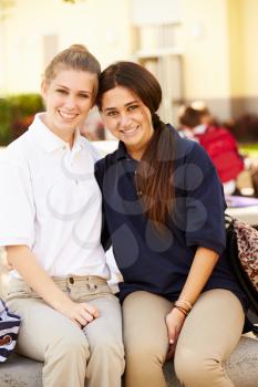 Portrait Of Two Female High School Students Wearing Uniform