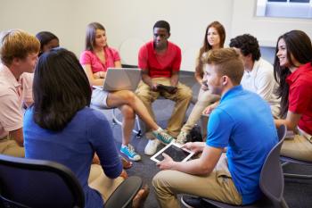 High School Students Taking Part In Group Discussion