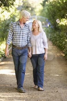 Senior couple on country walk