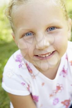 Portrait of little girl outdoors