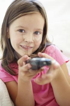 Little girl with remote control