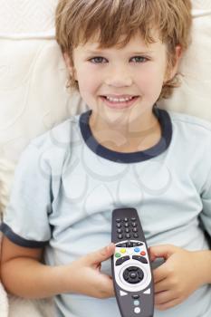 Young boy with remote control