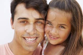 Portrait Of Hispanic Father And Daughter