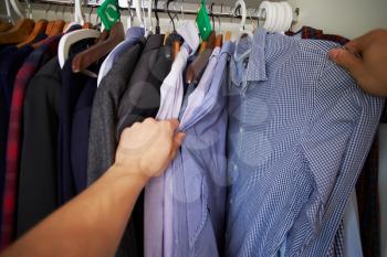 Point Of View Image Of Man Choosing Clothes From Wardrobe