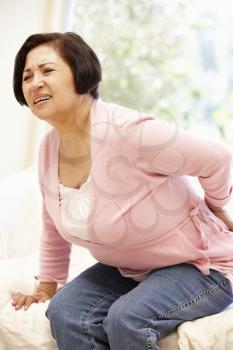 Senior Hispanic woman with backache