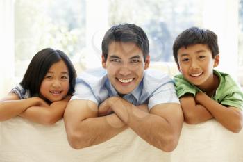 Asian father and children