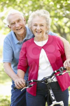 Senior couple with bike