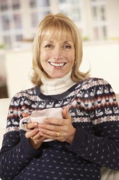 Portrait mature woman relaxing at home