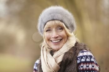 Portrait mature woman outdoors in winter