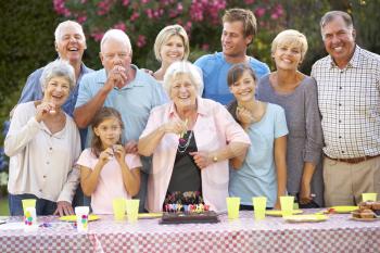 Large Family Group Celebrating Birthday Outdoors