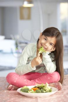 Happy Young Girl With Plate Of Fresh Vegetables