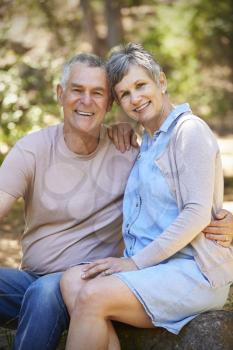 Portrait Of Loving Mature Couple In Countryside Together