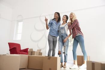 Three Female Friends Moving Into New Home Together