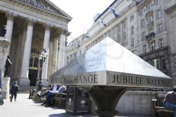 LONDON - MAY, 2017: Royal Exchange building, left, and Jubilee Walkway sign, Royal Exchange Square, London, EC3.