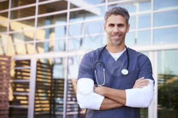 Middle aged white male healthcare worker outdoors, portrait