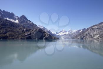 Glacier Flowing Into Lake In Alaska USA
