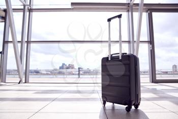 Unattended Suitcase Posing Security Threat In Airport Building
