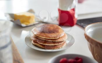 Stack Of Freshly Made Pancakes Or Crepes On Table For Pancake Day