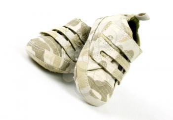 Baby camouflage shoes on a white background
