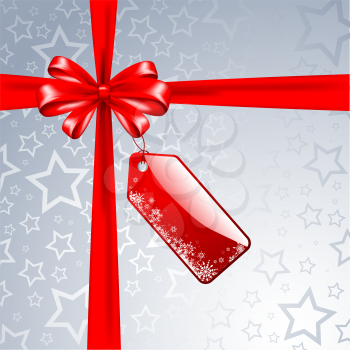 Christmas gift background with red ribbon and label