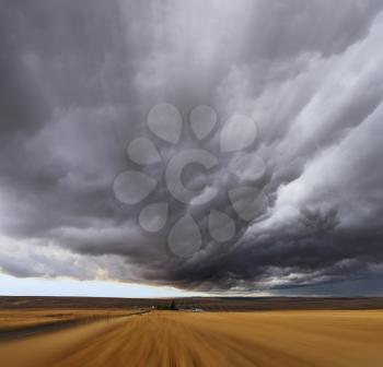 Royalty Free Photo of Thunderclouds in a Field in Montana