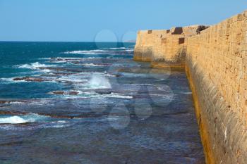 Superb kept protective fortification. Mediterranean sea, the ancient city of Akko, a sea surf