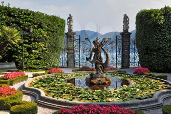 Lake Como, Villa Carlotta.  Magnificent park with fountains, statues, flower beds. 
