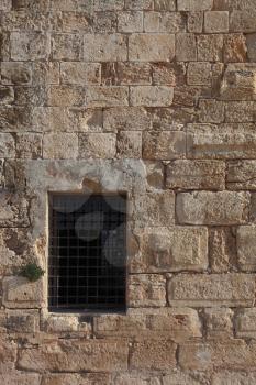 An ancient Crusader fortress. Large barred window