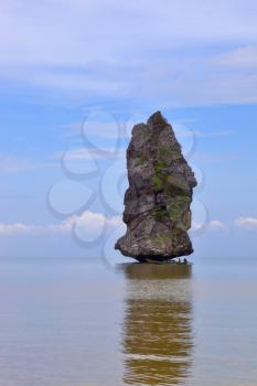 Foggy morning in the Gulf of Thailand. A magnificent island-rock Sail Rock
