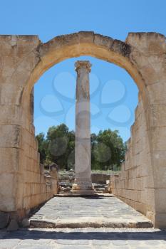 Arch and pillar of the Roman amphitheater at Beit Shean, Israel
