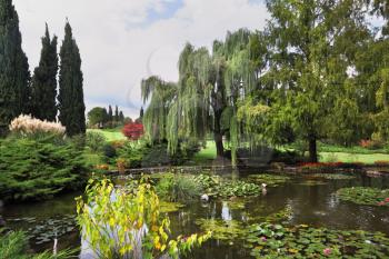Fabulously beautiful park-garden Sigurta. Ornamental pond and colorful flowers and trees