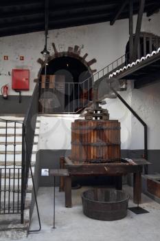 Press for wine in an old and successful winery. Production of precious and expensive wine Madeira