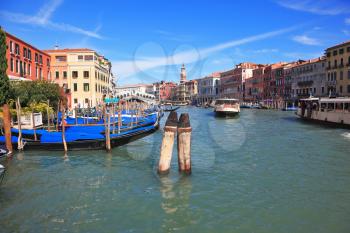 The famous Grand Canal in Venice. Fine sunny day. Vaporetto is transported by thousands delighted tourists. The photo is made a lens the Fish eye