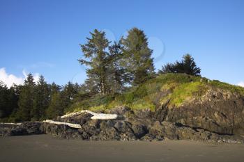 Small picturesque islands on an colossal sandy beach of Pacific coast of Canada
