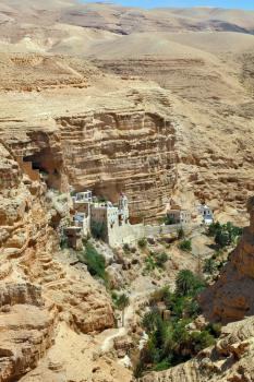 Wadi Kelt near Jerusalem. On the steep wall of the gorge - Monastery of St. George the Victorious.