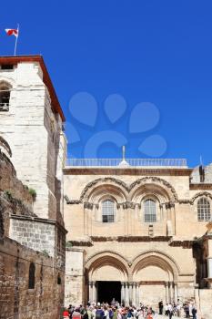 Church of the Holy Sepulchre in Jerusalem. The crowd of pilgrims and tourists at the entrance