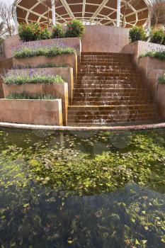  An original fountain and flower beds in a court yard of fine hotel on Red sea