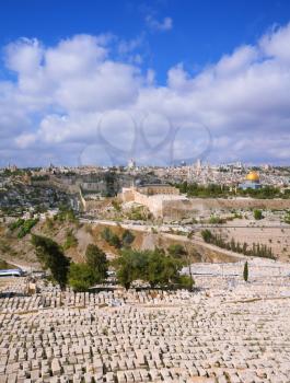  The ancient Jewish cemetery on the Mount of Olives. Ancient Jerusalem and the mosque Masjid Al-Sahra Kubbat.