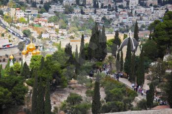 Ancient holy Jerusalem from the Mount of Olives. Golden domes of an Orthodox church of Mary Magdalene
