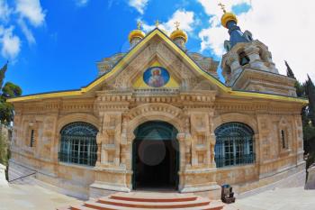  Above the triangular portico golden domes topped with golden crosses. Orthodox Church of Mary Magdalene in Jerusalem