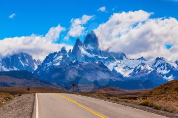 The road through the desert. The highway crosses the Patagonia and leads to the mountains Fitz Roy
