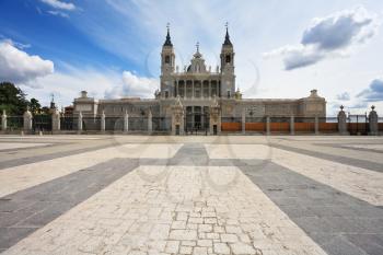 The magnificent Royal Palace in Madrid. The huge stone paved square in front of the castle 