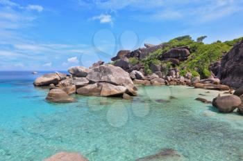 Azure and smooth water lagoon. Rest on the Similan Islands, Thailand