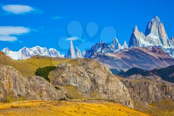 Amazing tops of Mountains Fitzroy are lit with the midday sun. Patagonia in February