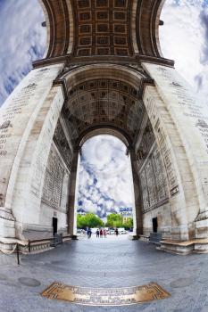 The striking and unexpected angle Arc de Triomphe in Paris. Photo was taken Fisheye lens
