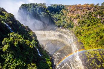 After the rainy season, the waterfall most high water. The famous Victoria Falls on the Zambezi River in South Africa