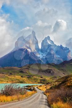 Summer day in the national park Torres del Paine, Patagonia, Chile. Majestic peaks of Los Kuernos over Lake Pehoe